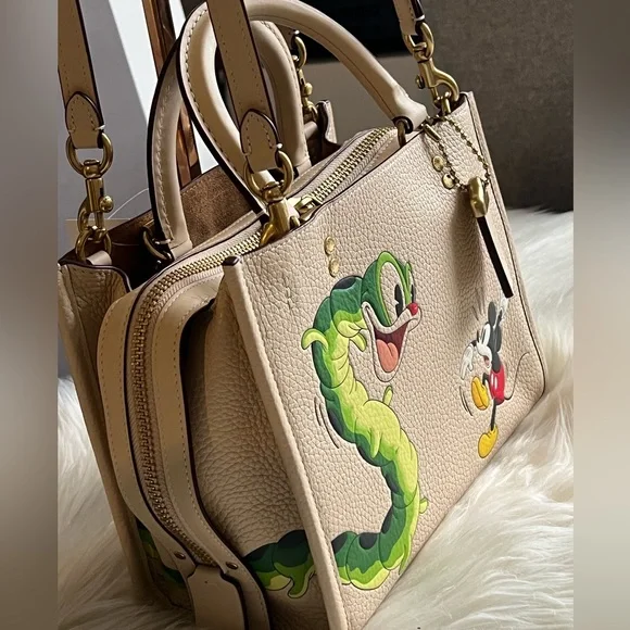 💰SOLD - CH461 - Disney X Coach Rogue 25 with Mickey Mouse and Caterpillar - Picture 2 of 16